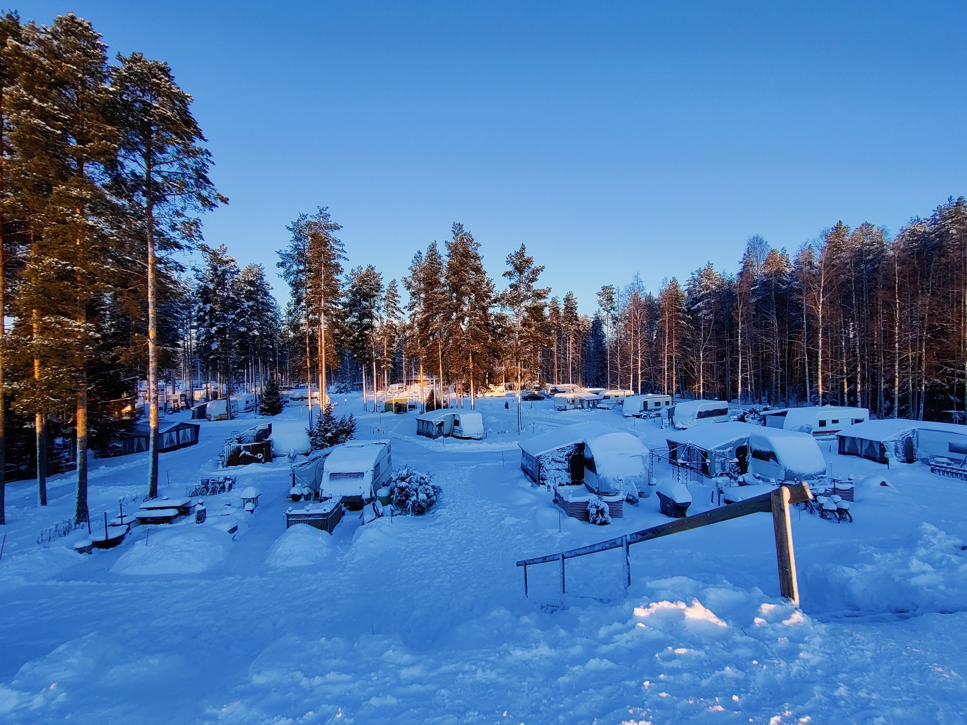 A view of caravans at SF-Caravan-Kalajärvi covered in snow in winter