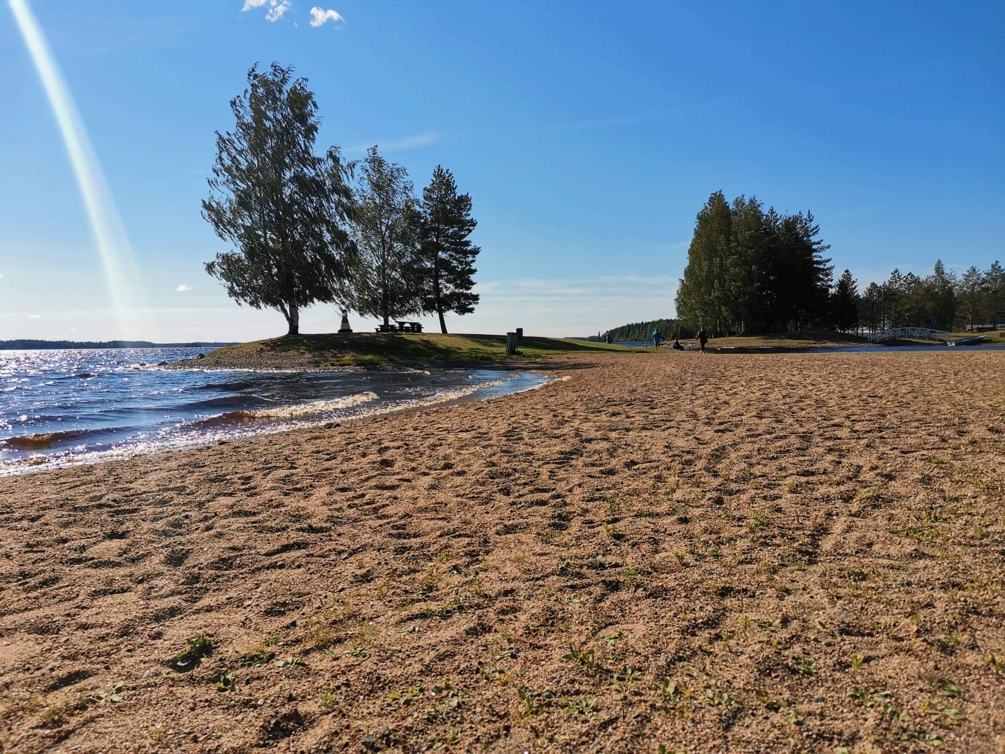 Beach at Lake Kalajärvi with sun shining